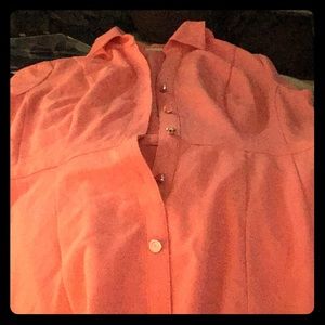 A flare button down coral dress